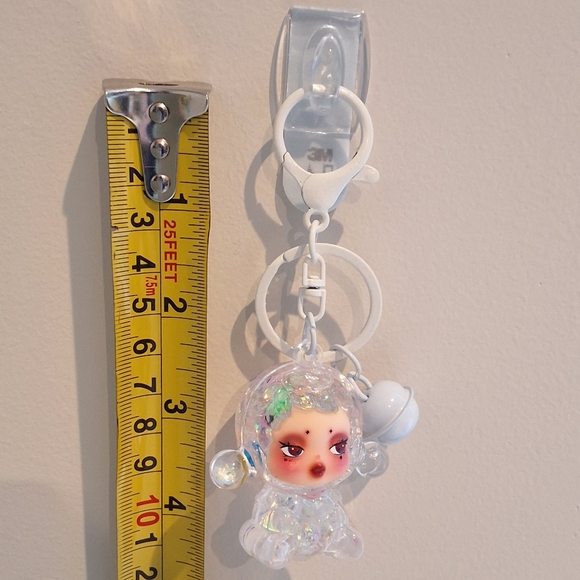 Skullpanda Clear Beaded Liquid Filled Shaker White Keychain Bag Charm W/ Bell - Picture 4 of 4